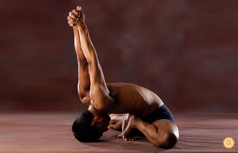Downward Facing Twisted Feet Bound Angle Pose