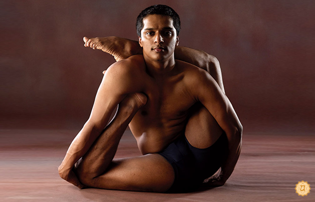 Foot Behind The Head In Yogi's Meditating Stick Pose