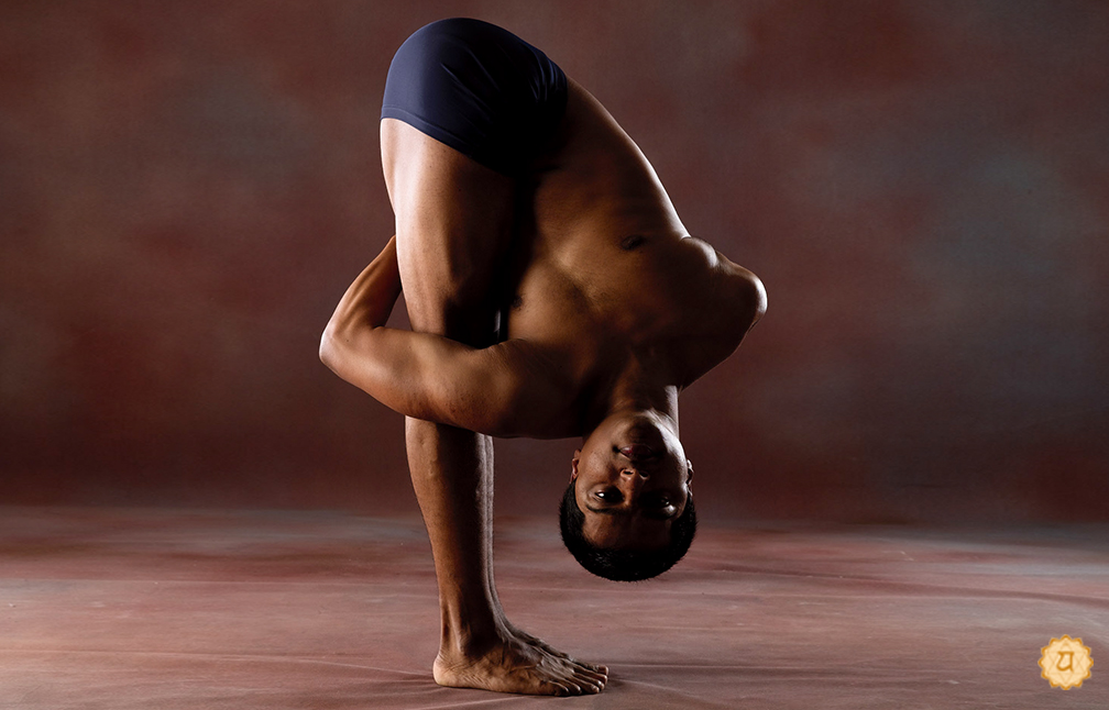 Bound Legs Twisted Forward Bend Pose