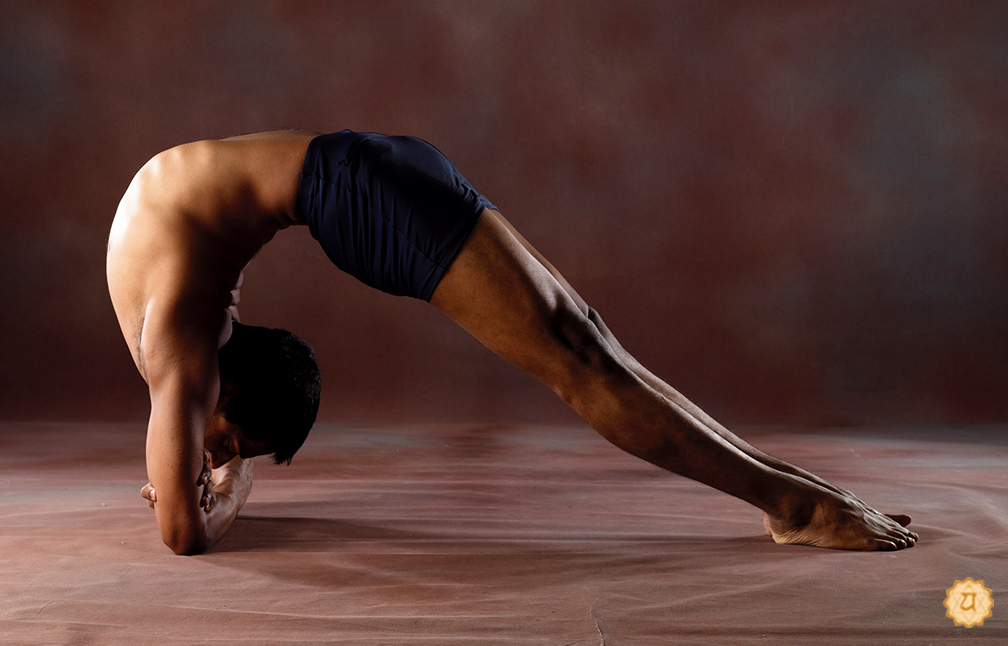 Bound Arms Both Legs Inverted Staff Pose